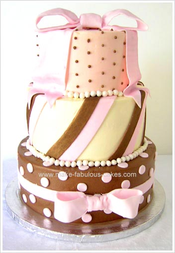 This modern pink and brown bridal shower cake is a great centerpiece for any
