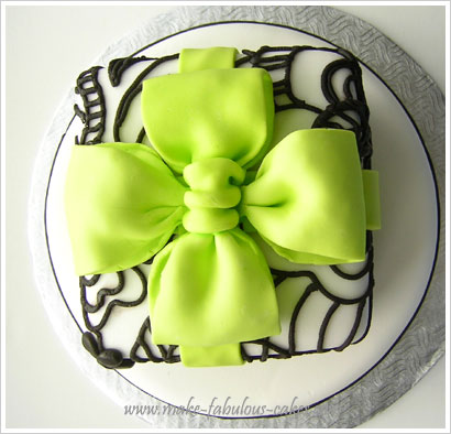 wedding shower cake bow For the band of green fondant on the bottom tier 
