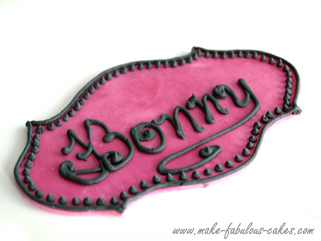 gum paste plaque with royal icing