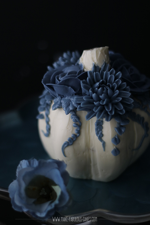 White pumpkin cake with blue flowers