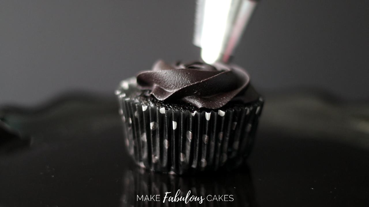 black cocoa frosting cupcake