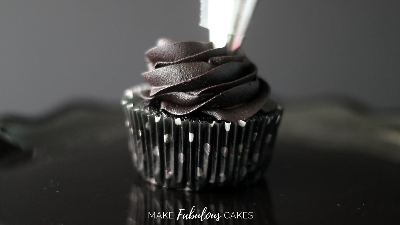 black cocoa frosting cupcake