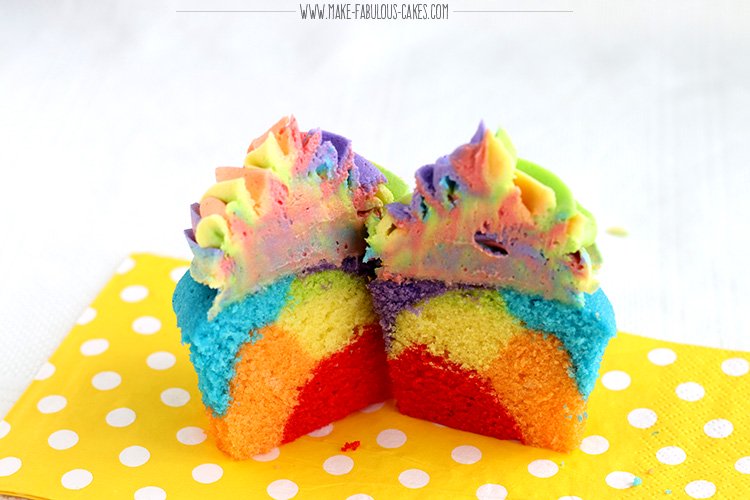 cut rainbow cupcakes with rainbow frosting
