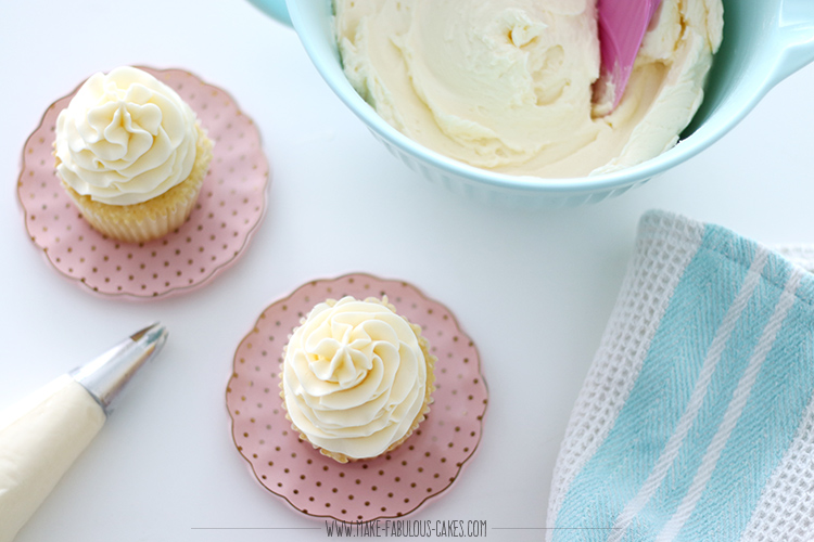 Piping Buttercream Frosting on Cupcakes